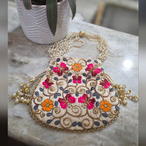 Embroidered Floral Potli Bag w/ Pearl Strap & Tassels